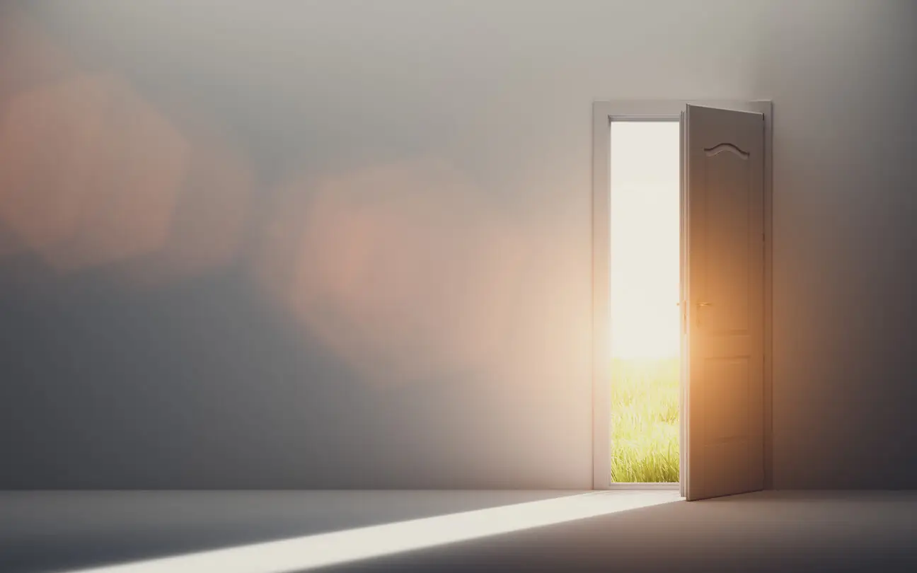 Door opening to sunlight
